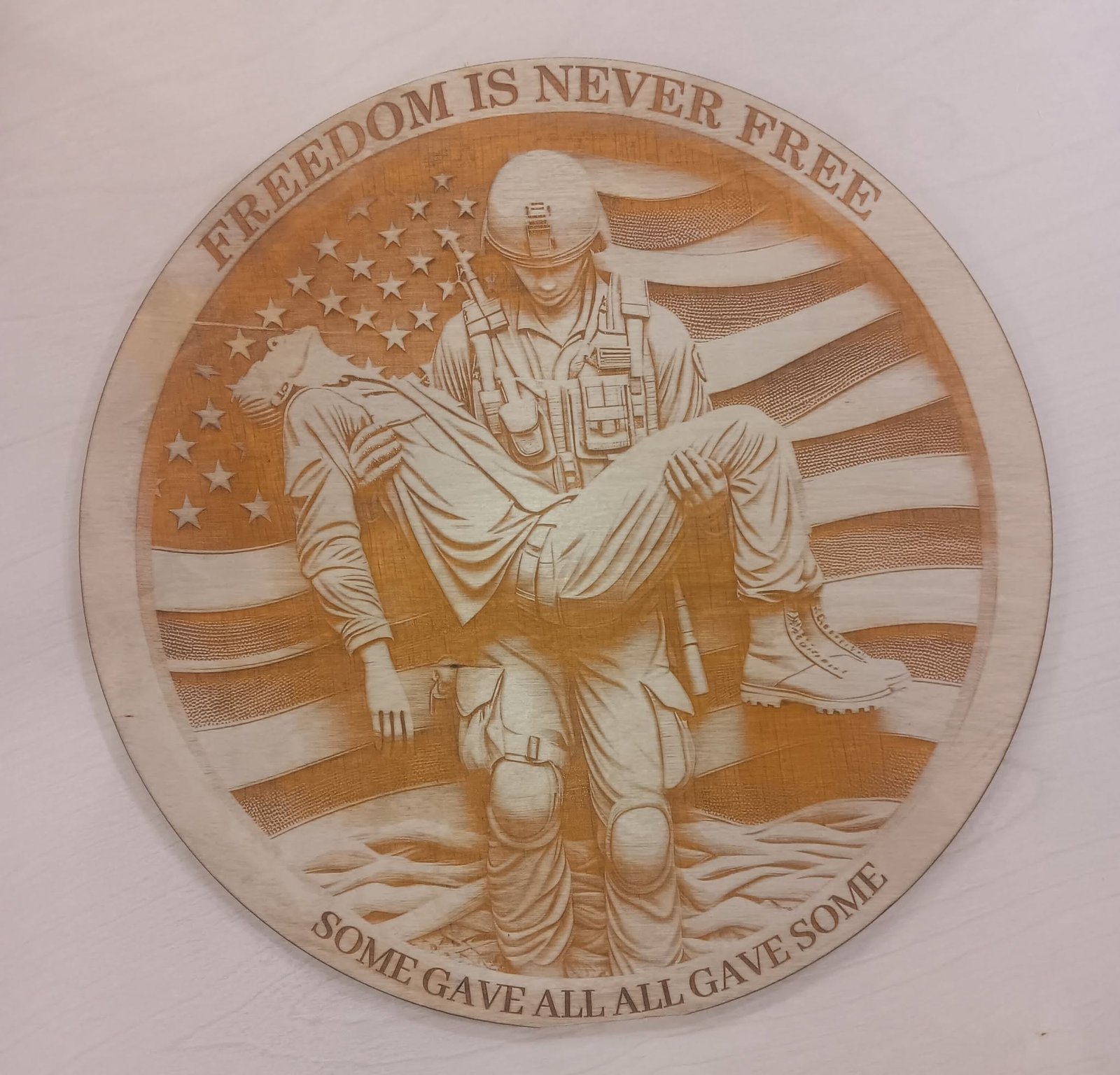 Custom engraved patriotic wood sign reading Freedom Is Never Free